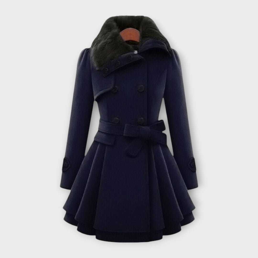 Dark blue women's elegant long flared coat with a luxurious faux fur collar. Essential winter outerwear.