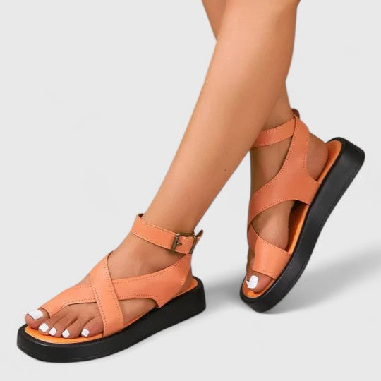 Chic and comfortable women's flat sandals, versatile for spring & summer style.