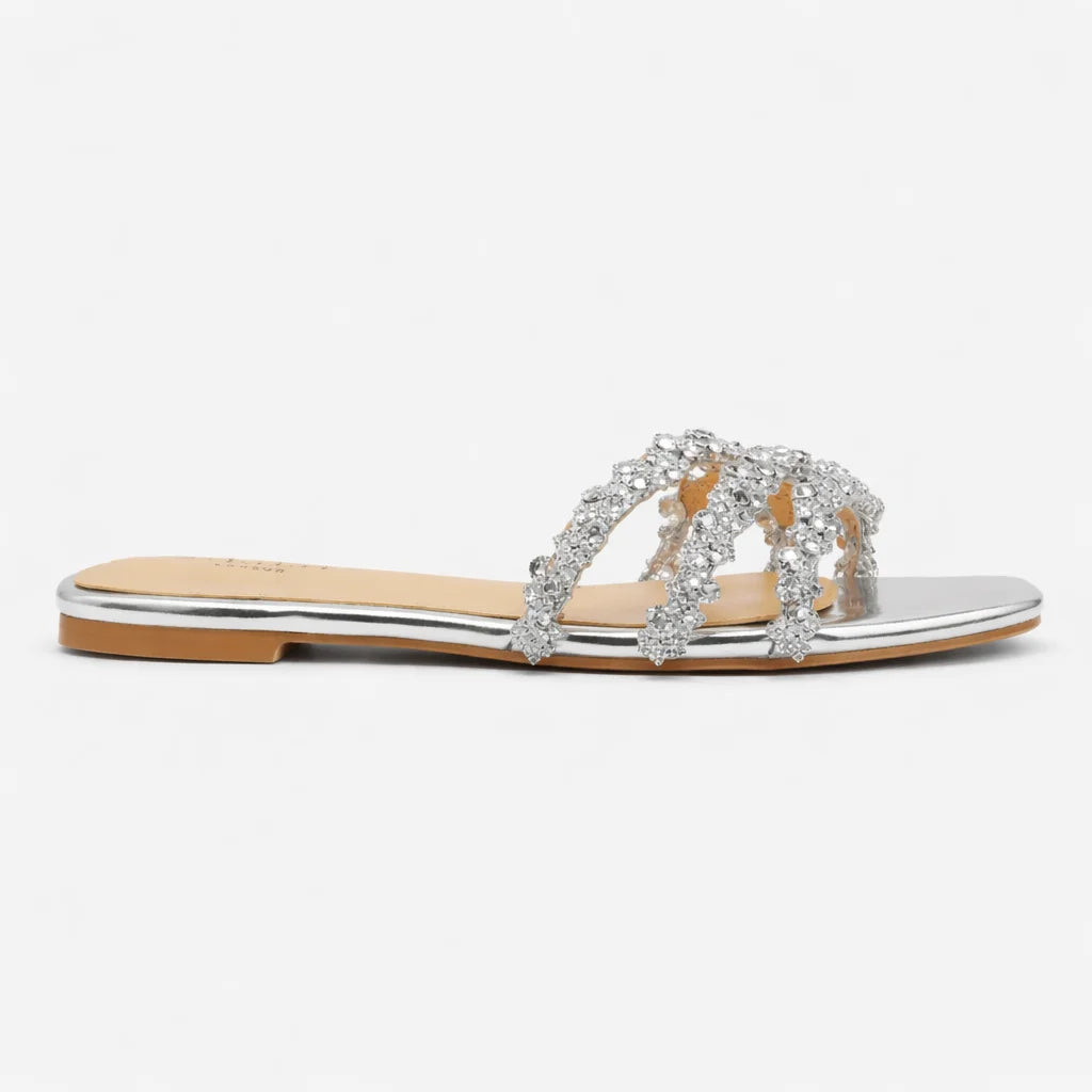 Women's slip-on flat sandals with crystal embellishments and a trendy square toe. Comfortable summer style.