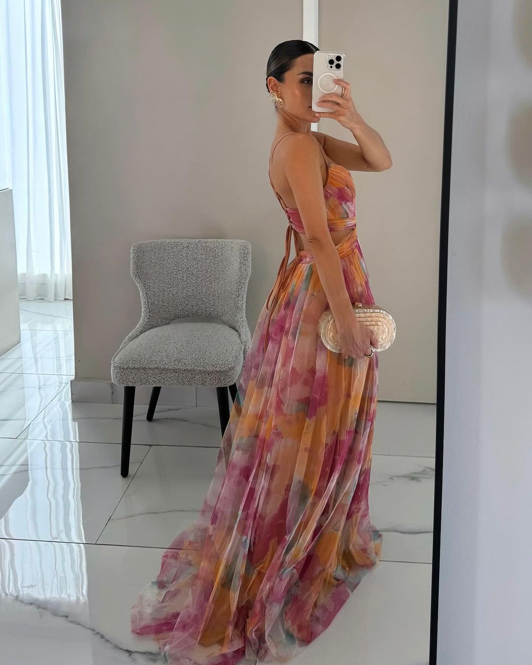 Summer A-line maxi dress with vibrant floral print, ideal for elegant occasions.