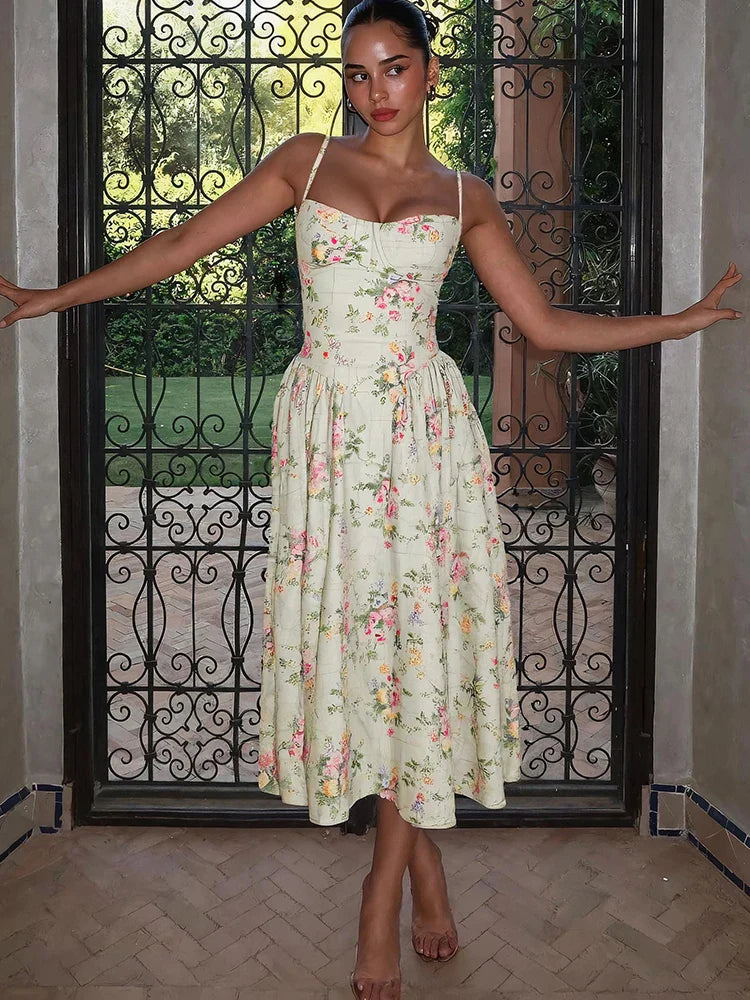 Beautiful women's floral A-line midi dress, a stylish wedding guest outfit and formal special occasion wear.