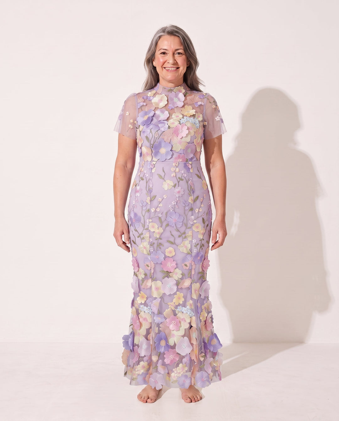 Trendy women's floral appliqué midi dress, an elegant choice for autumn wedding guests and fashionable occasion wear.