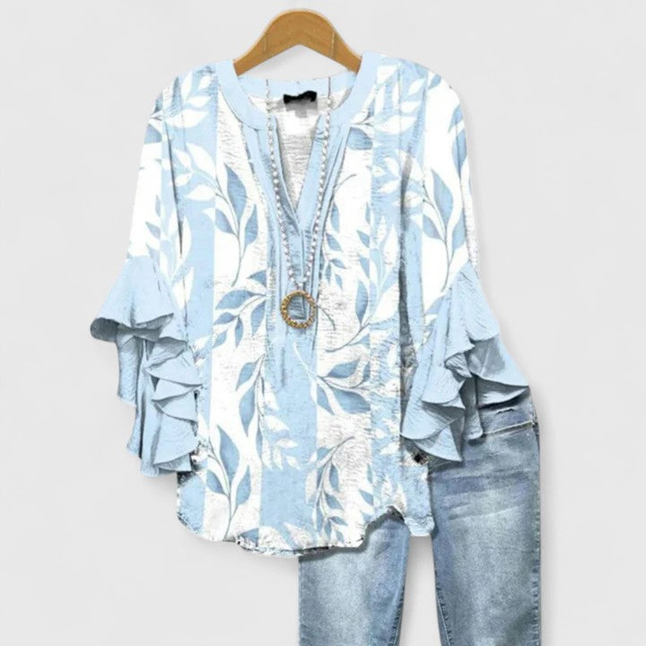 Women's comfortable floral print blouse with elegant ruffle sleeves, a chic top for ladies.