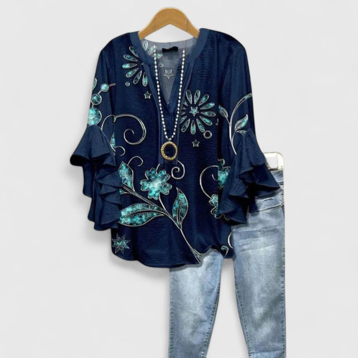 Printed floral women's blouse, a comfortable and elegant top with ruffle sleeves for spring fashion.