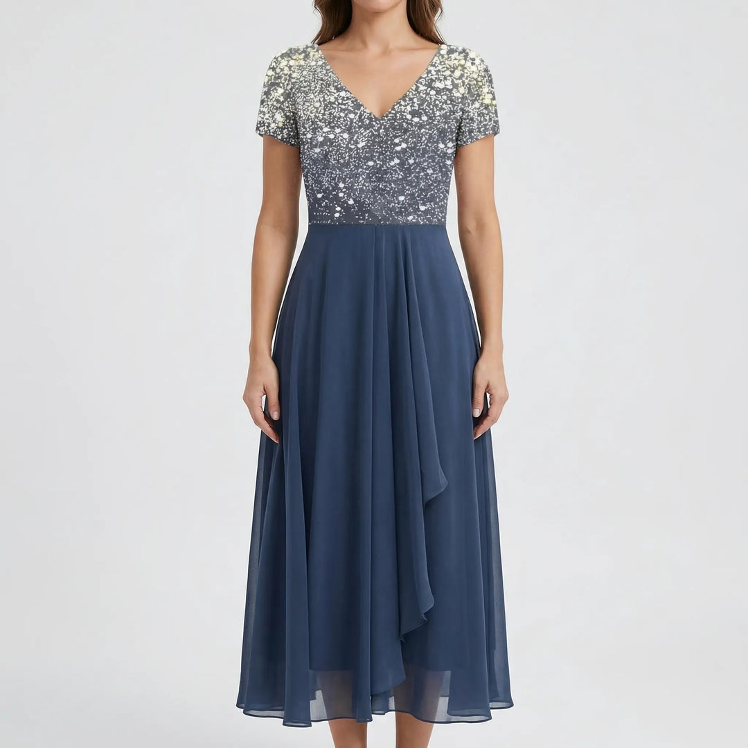 Versatile women's elegant floral midi dress. A-line cut, V-neck, & cap sleeves suitable for various formal occasions.