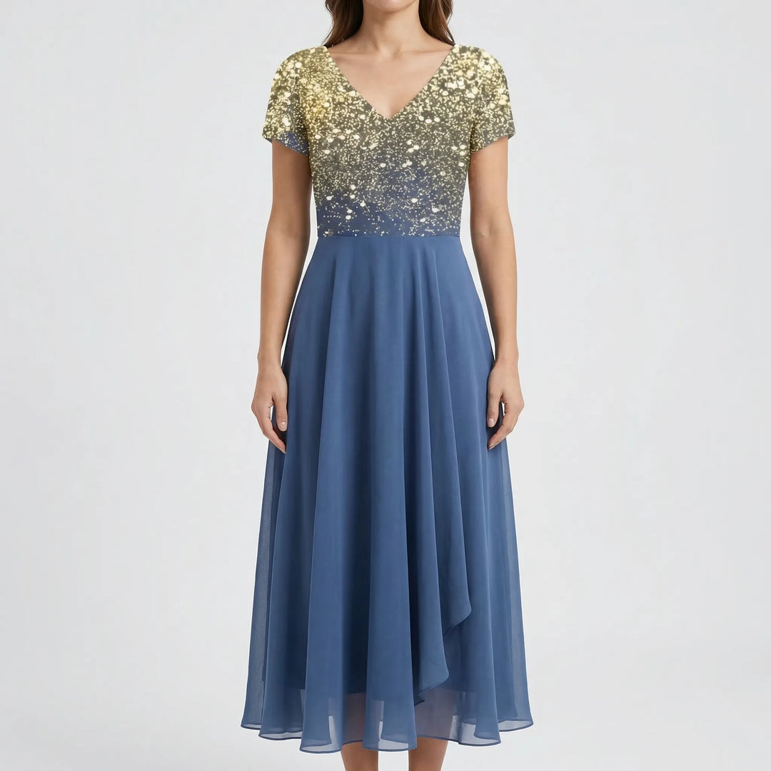 Women's elegant floral midi dress with a flattering V-neck bodice, short sleeves, & a beautiful A-line skirt.
