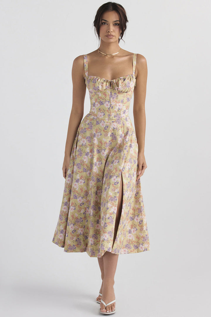 Elegant women's floral bustier midi dress, perfect for wedding guests, featuring a stylish slit and summer design.