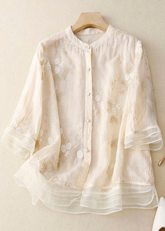 Versatile floral print top for women, featuring a button-down front and elegant 3/4 sleeves.