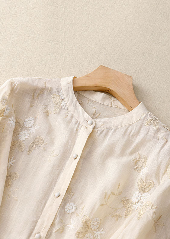 Stylish women's 3/4 sleeve floral blouse with a modern layered hem, ideal for casual summer wear.