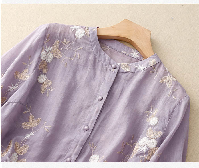 Professional yet casual women's floral button-down blouse with elegant 3/4 sleeves for versatile styling.
