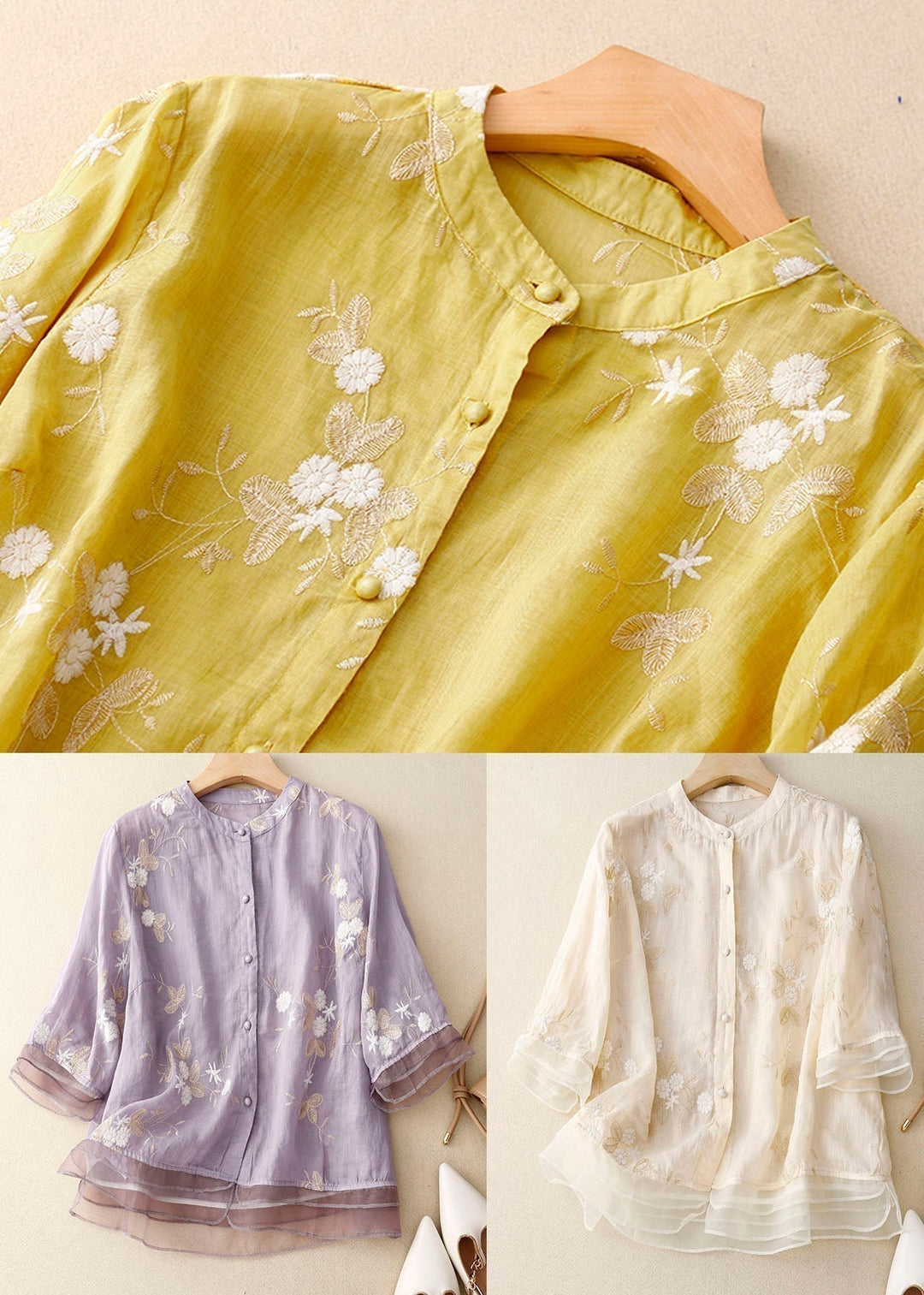 Comfortable women's floral blouse, a chic button-down top with 3/4 sleeves and a flattering layered hem.