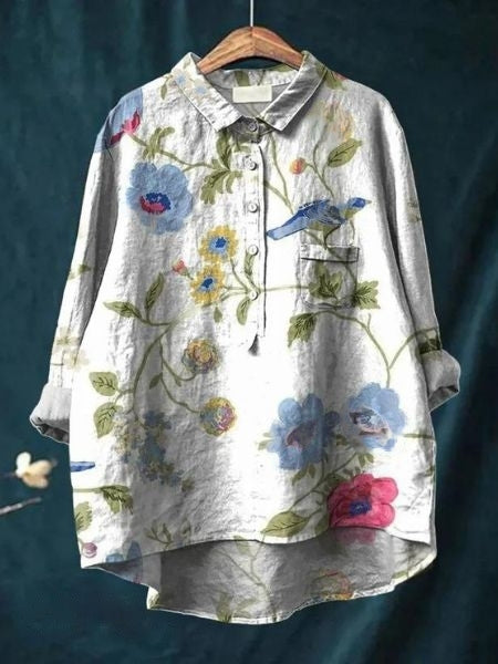 Stylish women's floral button-up blouse with long sleeves, ideal for spring fashion.