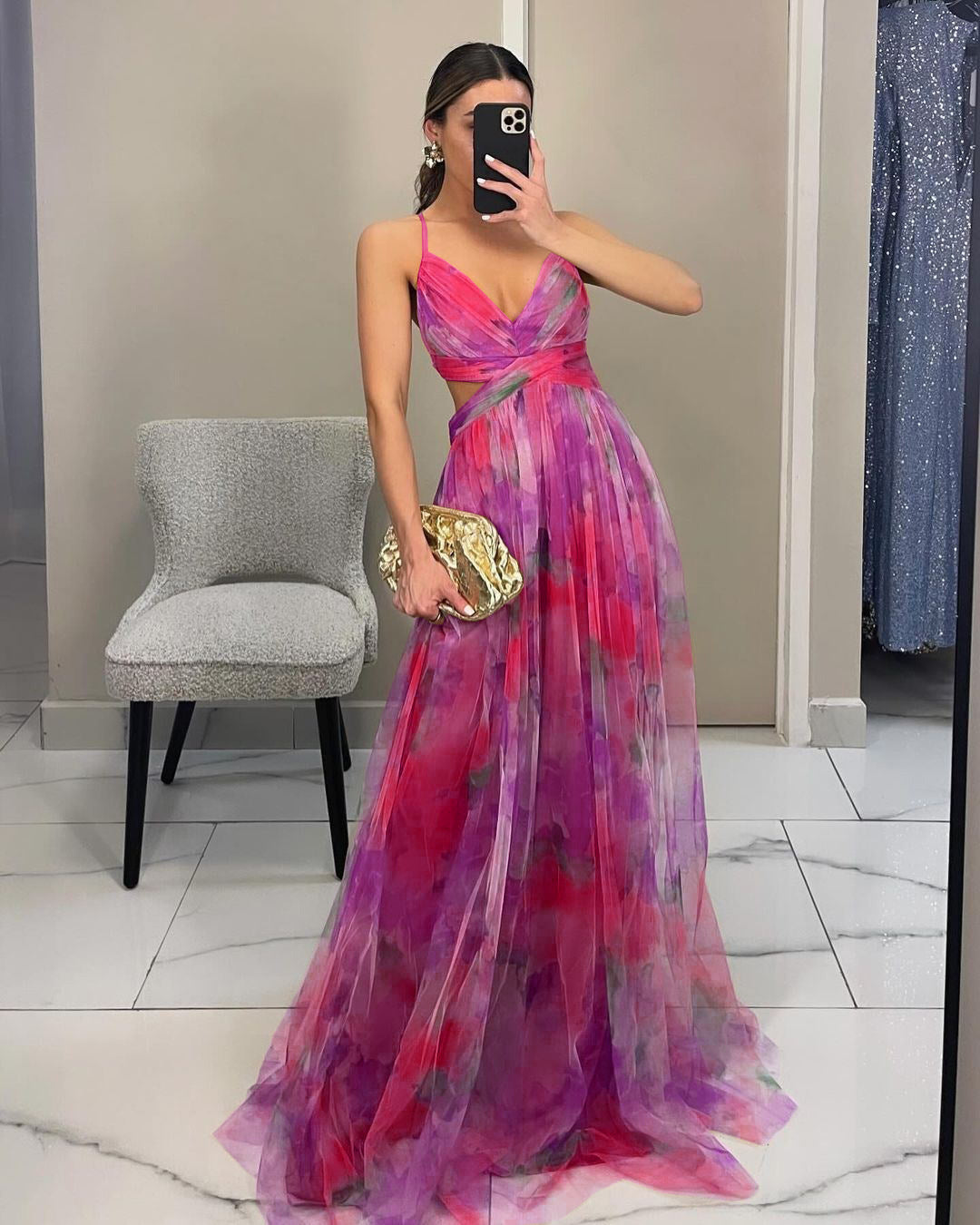 Women's stylish formal dress crafted from lightweight floral chiffon.
