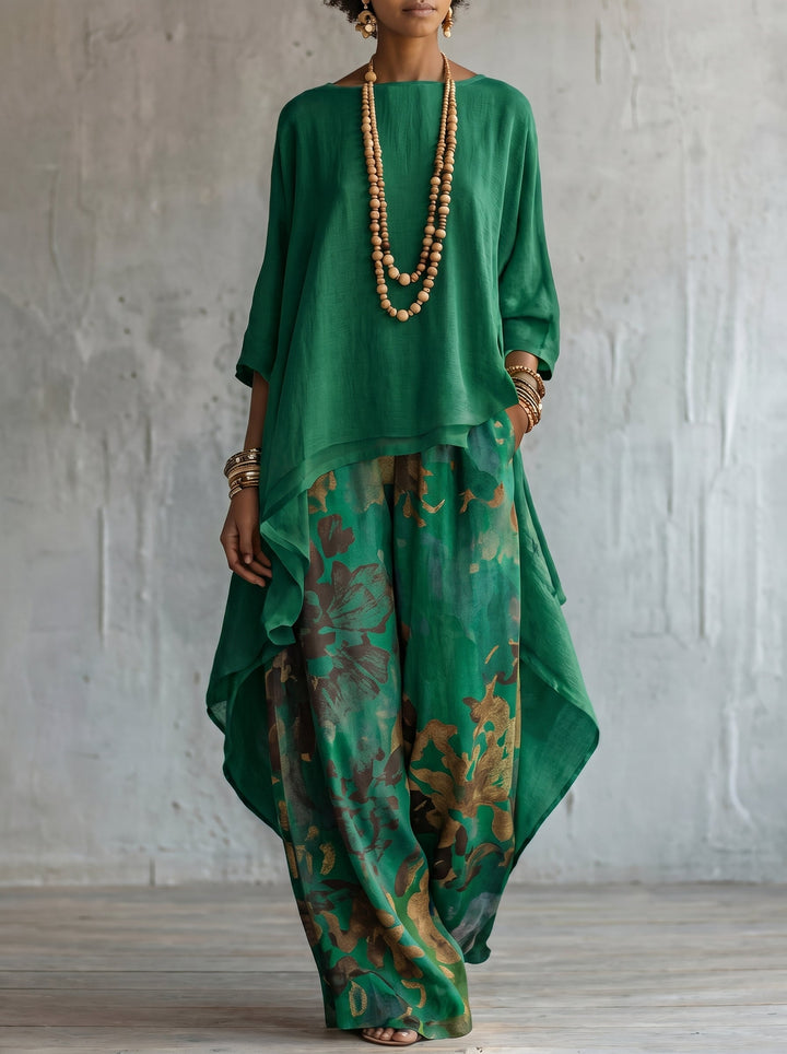 Chic women's floral matching set featuring an elegant tunic and flowy wide leg pants. Stylish summer outfit.