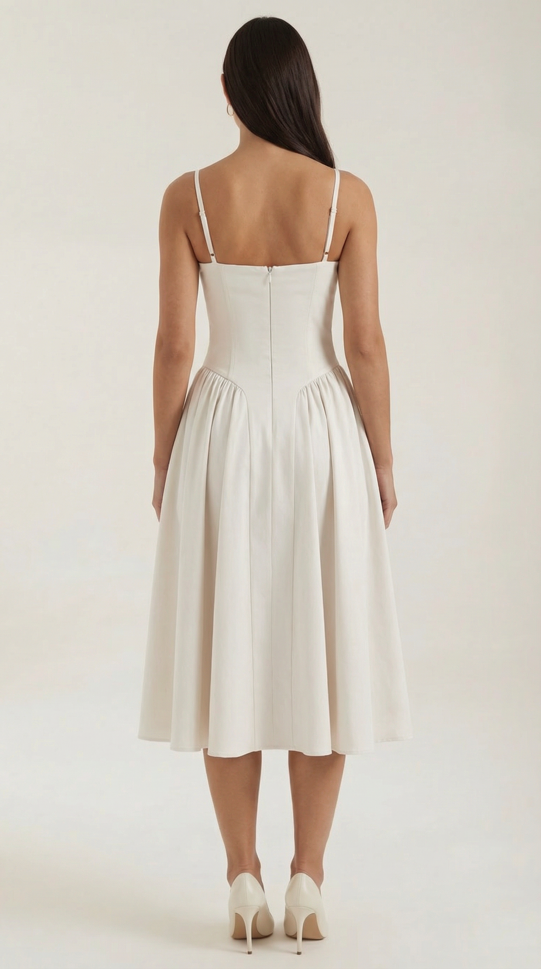 Wedding guest floral midi dress with a stunning sweetheart neckline and elegant corset styling.