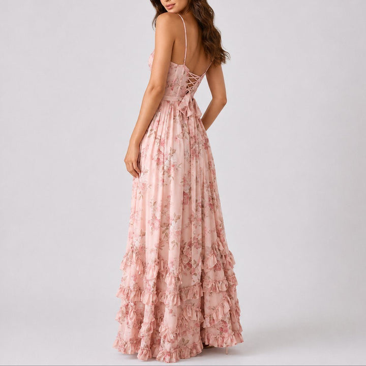 Graceful women's tiered A-line maxi dress, adorned with floral print & corset for special events.