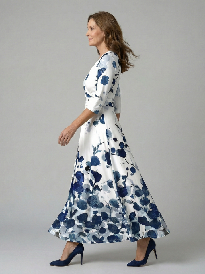 Women's flowy three-quarter sleeve floral midi dress with a stylish cross wrap V-neck.