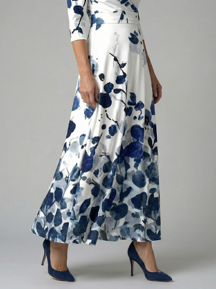 Stylish women's floral print midi dress, elegant cross wrap neck & 3/4 sleeves for modern fashion.