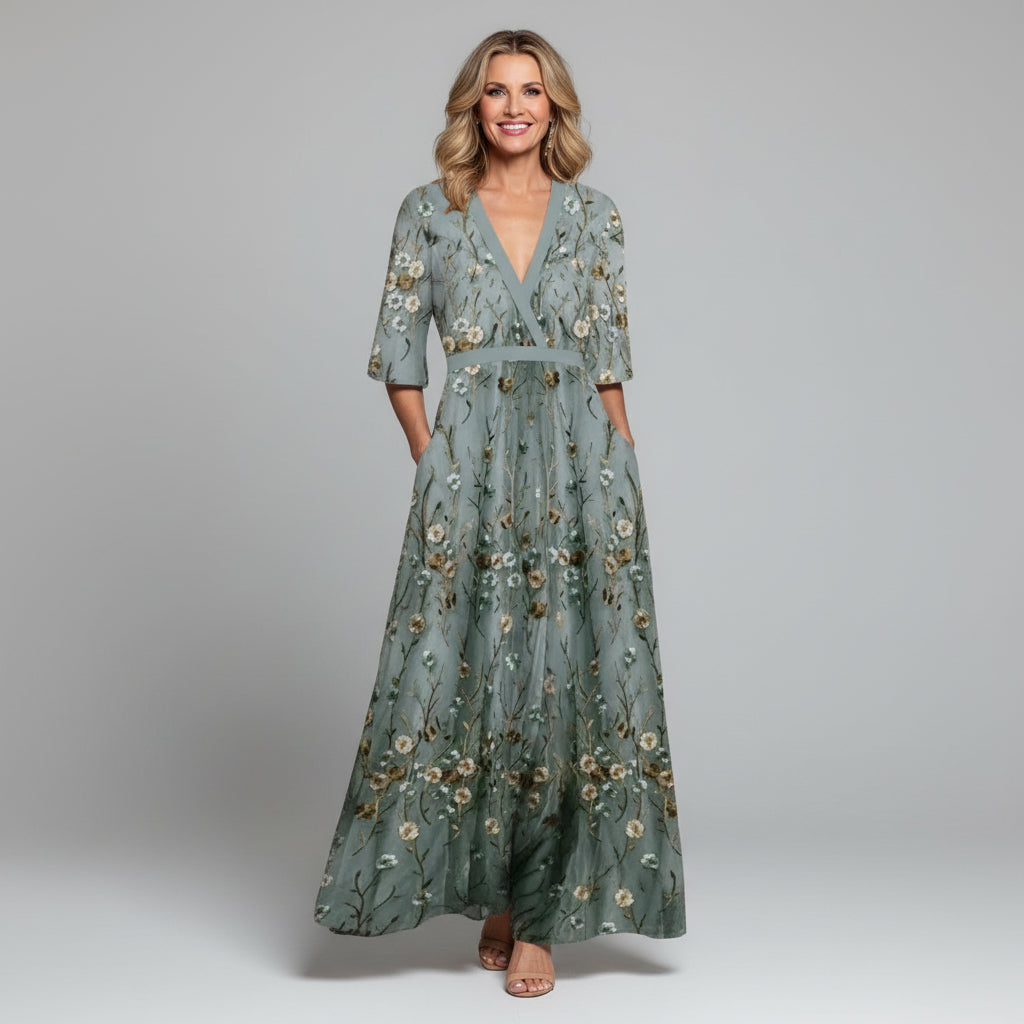 Beautiful boho-style maxi dress with intricate floral embroidery for wedding guests.