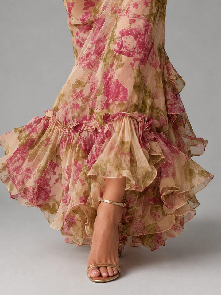 Chic women's floral puff sleeve maxi dress, a fishtail design for elegant wedding guest or formal occasion wear.