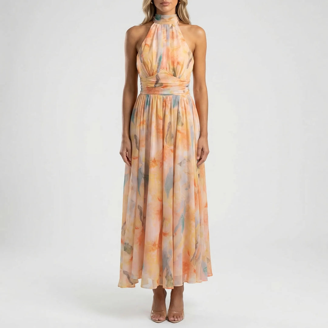 Beautiful women's peach coral floral maxi dress. Halter-neck style, perfect for elegant summer wear & special events.