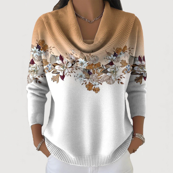 Close-up of a soft knit women's floral sweater, showcasing intricate detailing and elegant design.