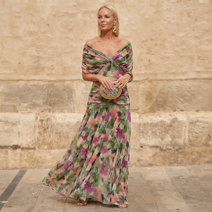 Stylish women's flowing floral maxi dress with V-neck, elegant for evening wear, summer, or special occasions.