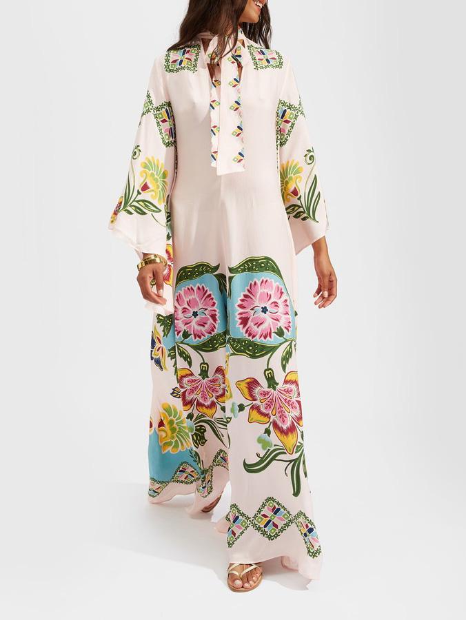 Lightweight women's cream floral maxi dress with long sleeves, offering comfortable elegance for spring and summer.