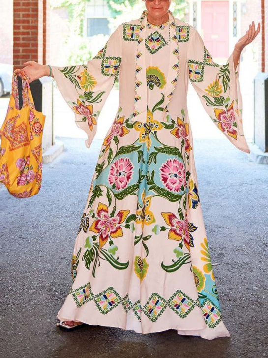 Beautiful floral pattern cream maxi dress for women. Long sleeve, flowy, and elegant, suitable for various events.