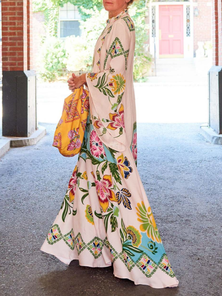 Sophisticated women's long sleeve floral maxi dress in a cream hue, a versatile and elegant piece for modern fashion.