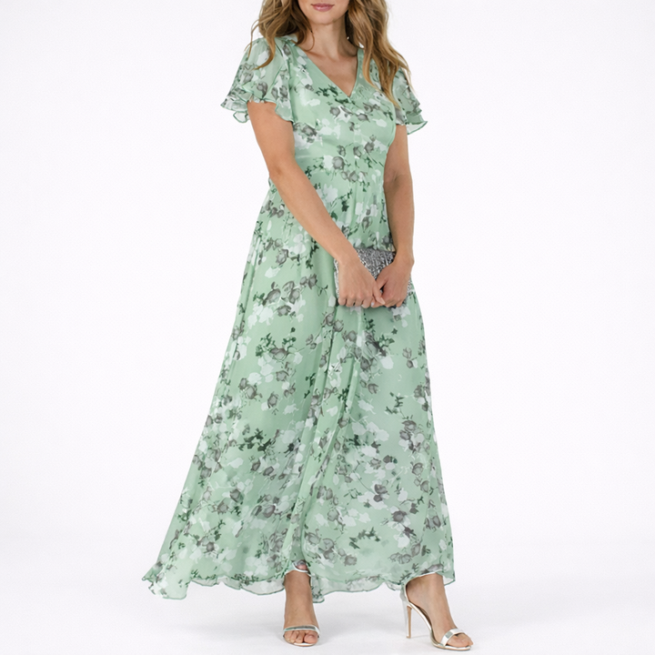 Stylish women's summer maxi dress with elegant floral pattern, great for resort & special occasions.