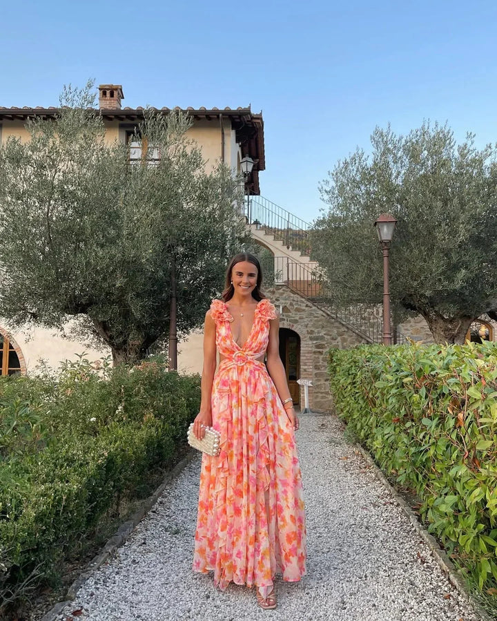 Elegant women's floral maxi dress with ruffles & cut-outs, perfect for wedding guests.