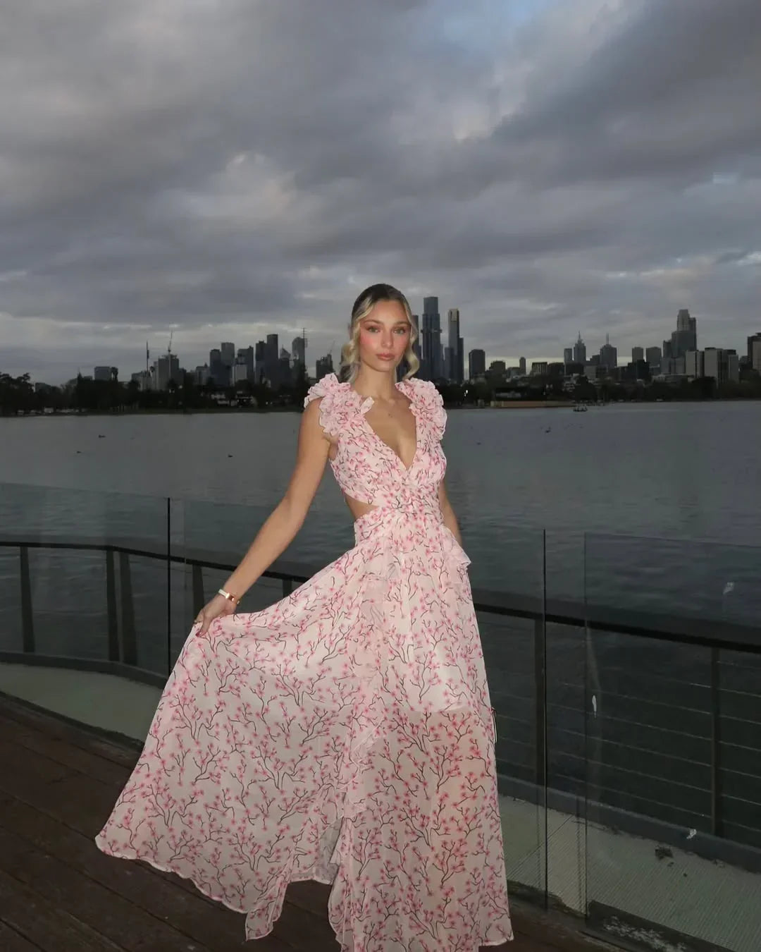 Wedding guest floral maxi dress, sleeveless with a V-neck, ruffles & stylish cut-out design.