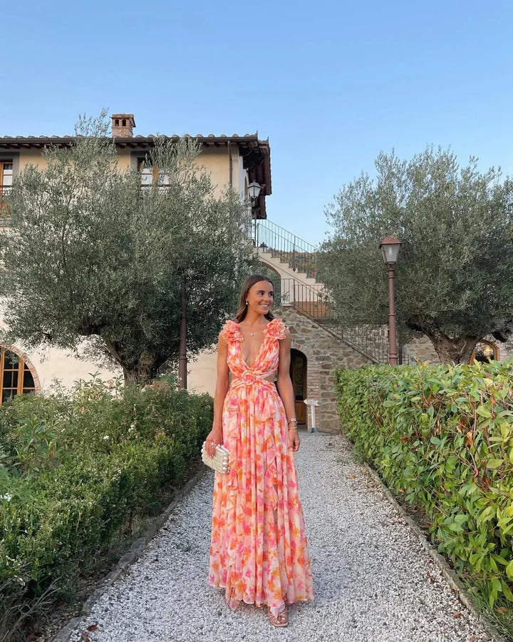 Summer floral maxi dress for women, featuring ruffles, cut-out details & a chic V-neck.