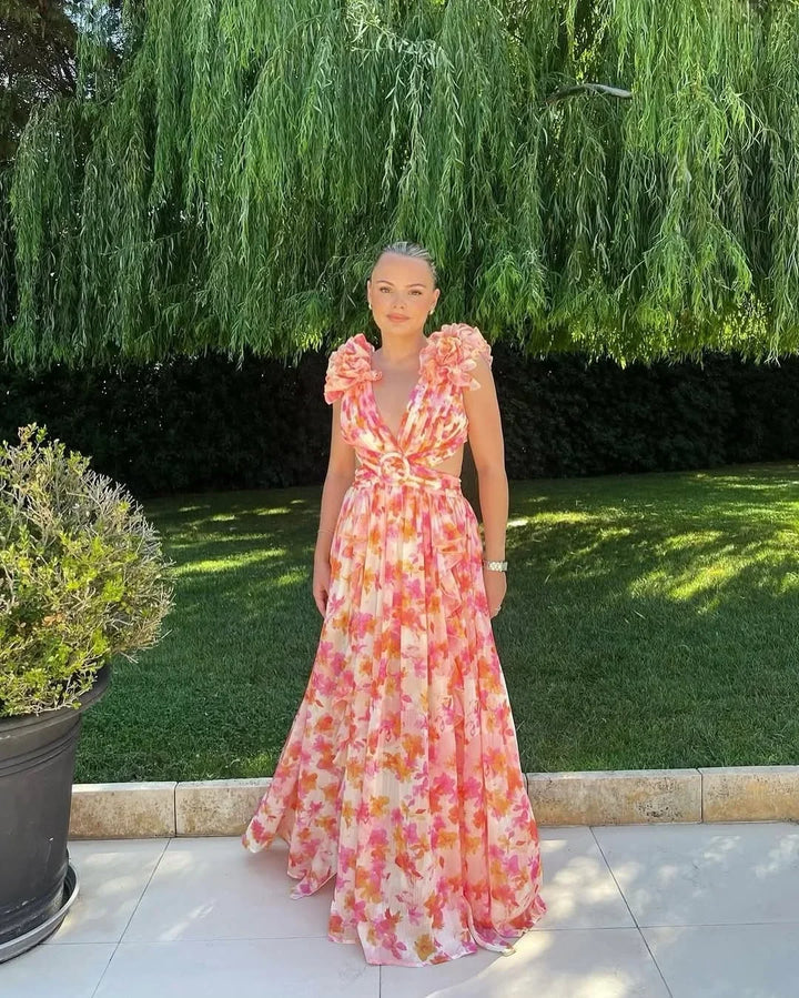 Women's elegant V-neck floral maxi dress with ruffles & cut-outs, great for evening wear.