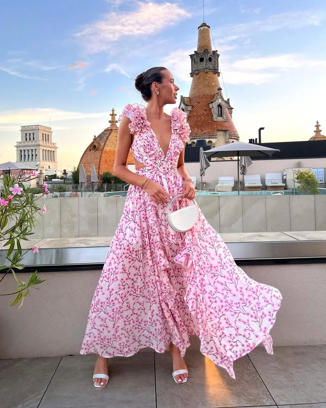 Long floral print maxi dress with ruffles, cut-outs & V-neck, elegant wedding guest attire.