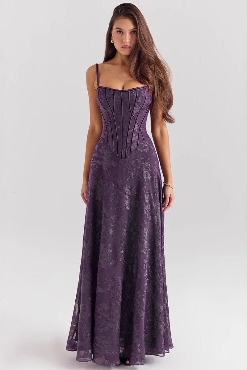 Elegant women's floral maxi dress with spaghetti straps for formal occasions.