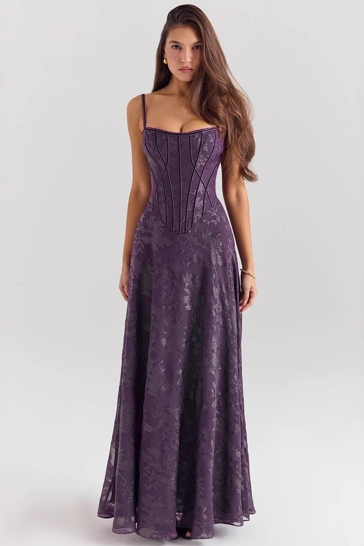 Elegant women's floral maxi dress with spaghetti straps for formal occasions.