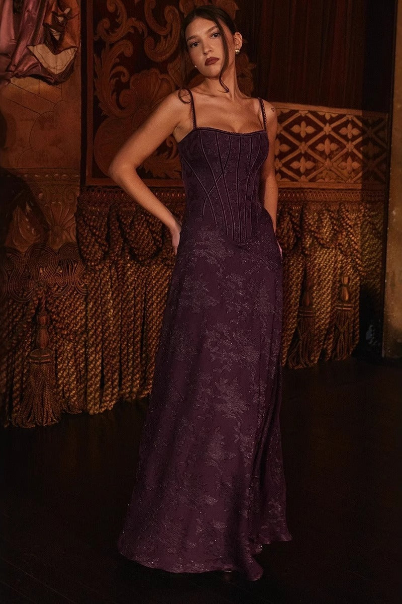 Women's long floral dress with spaghetti straps, ideal for parties.