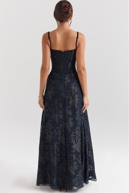 Stylish women's floral maxi dress with spaghetti straps for a formal look.