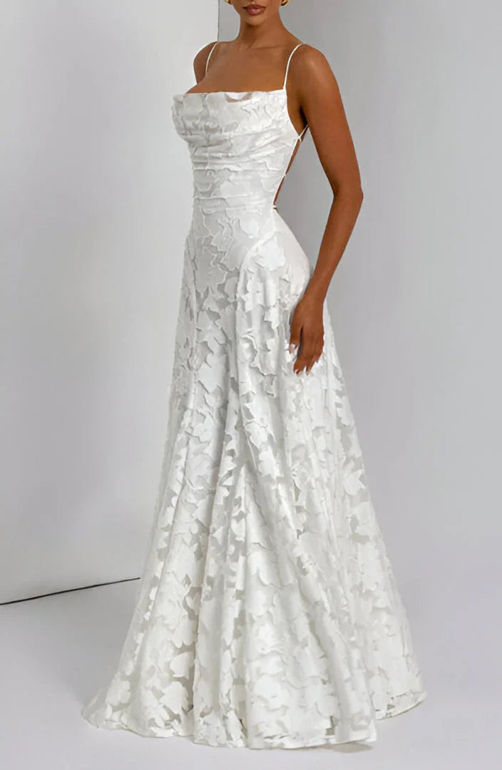 Vibrant floral maxi dress for women, with spaghetti straps, great for holiday style.