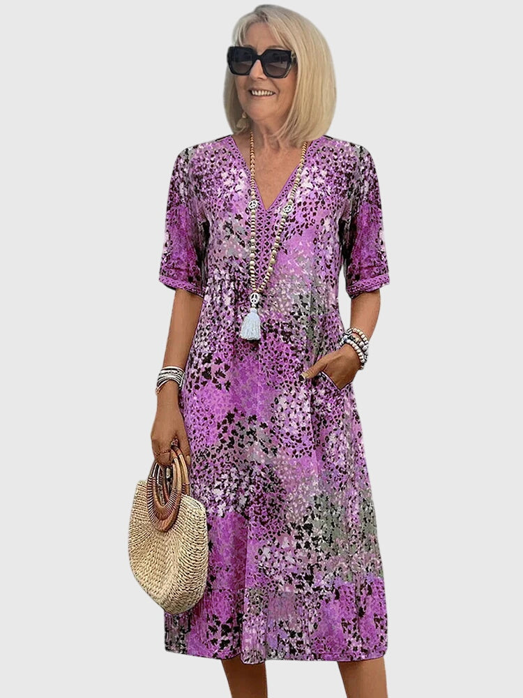 Comfortable women's elegant floral midi dress, perfect for flattering spring/summer style.