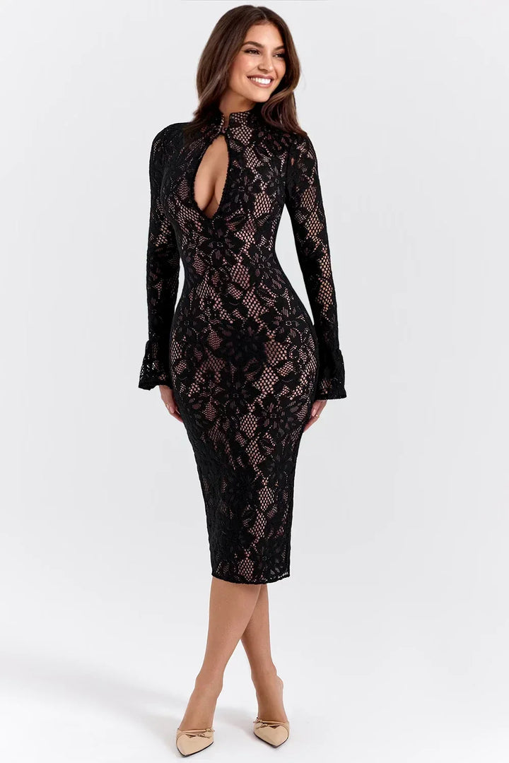Elegant women's floral midi dress with a beautiful print and lace detail. Perfect for occasion wear and party fashion.