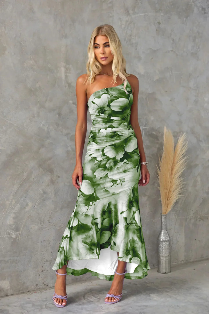 Fashionable women's floral midi dress with elegant one-shoulder design. Vibrant print, perfect flowy summer party wear.