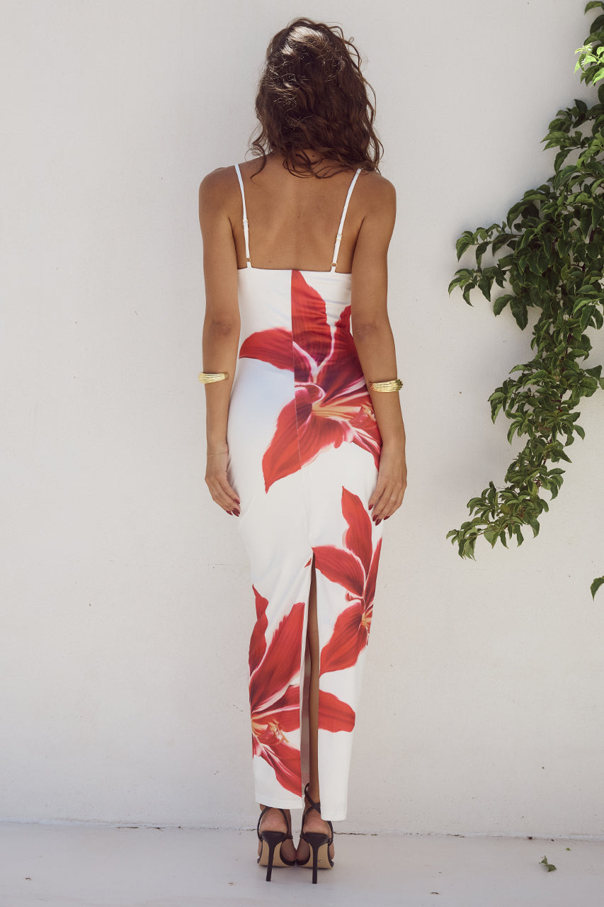 Chic floral print midi dress for women, ideal as a spring or summer dress. Features adjustable straps.