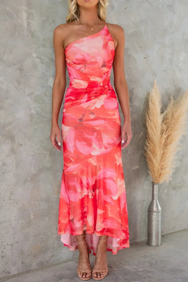Comfortable & elegant women's floral midi dress. One-shoulder design, flowy fabric, vibrant for summer parties.