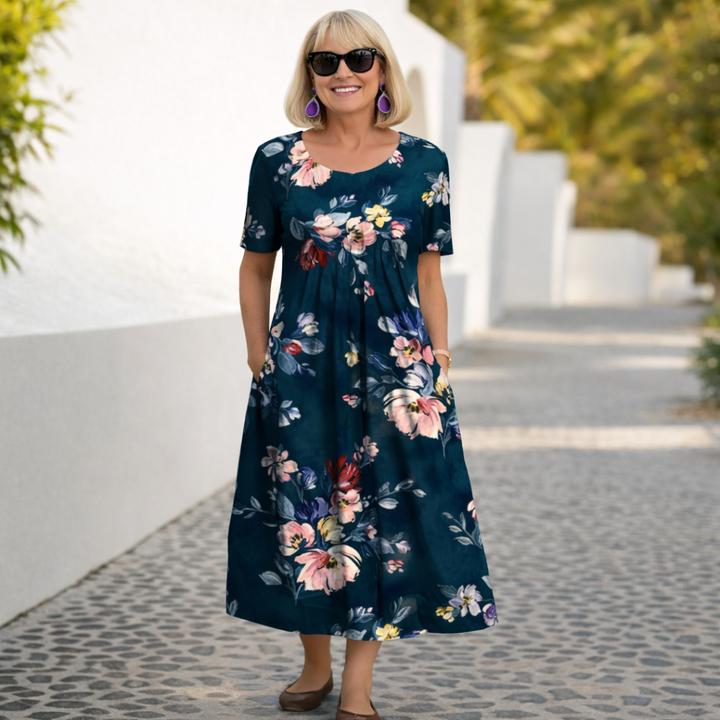 Chic women's floral midi dress, elegant & comfortable for summer casual wear.
