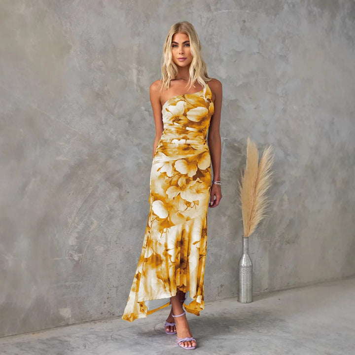 Elegant women's one-shoulder floral midi dress. Flowy summer dress with vibrant print, ideal for parties & brunch.