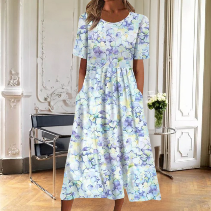 Comfortable women's floral midi dress, short sleeve, perfect for spring fashion & casual summer outings.