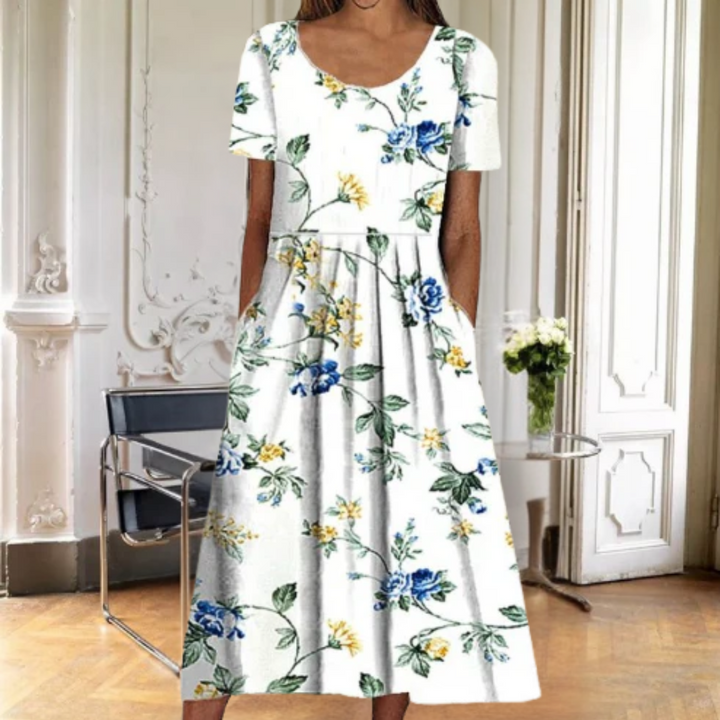 Stylish women's A-line floral midi dress, short sleeve, round neck, great for spring/summer casual & elegant looks.